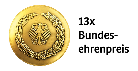 Eine goldene Bundesehrenpreis-Medaille mit dem Text 13x Bundesehrenpreis